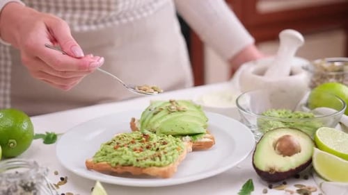 Preparing Healthy Avocado Toast Breakfast in Bright Kitchen
