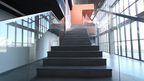 Stylish and Modern Office Building Lobby Interior Large Panoramic Windows and Stairs with