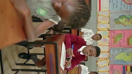 Vertical Shot Of Students Studying At School In Uganda