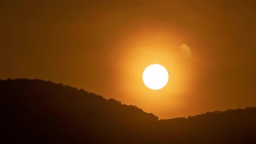 Golden Sunset over Mountain Peaks