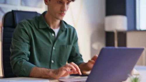 Emotional Businessman Rejoicing Success Working with Documents in Office Closeup