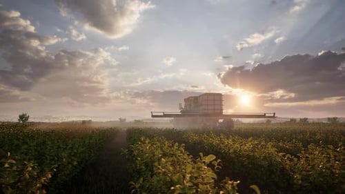 Farming Tractor Plowing And Spraying On Field