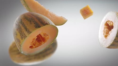 Sliced Cantaloupe Rotating in Frame