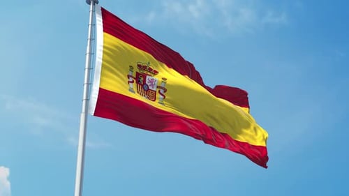 Realistic Waving Spanish Flag against a Blue Sky