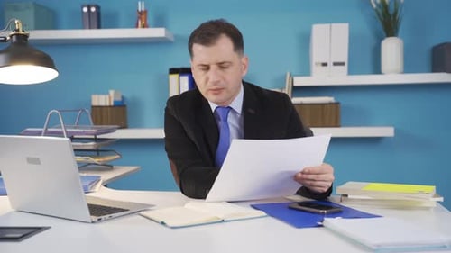 A busy businessman. Hardworking businessman.