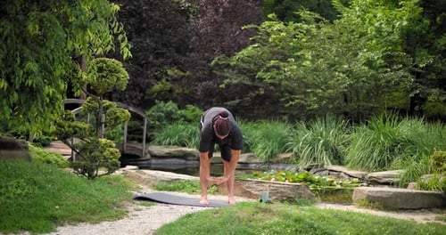 Healthy African American Man Exercising Ar Park Outdoor Practicing Yoga