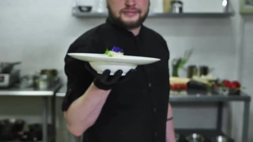 Delicious Spaghetti is Ready to Serve in the Chef's Hands