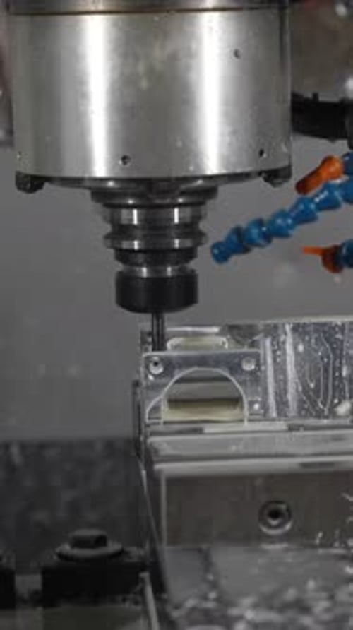CNC Mill Machine Working on Metal
