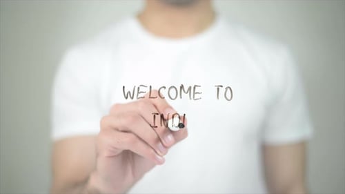 Welcome to India, Man Writing on Transparent Screen