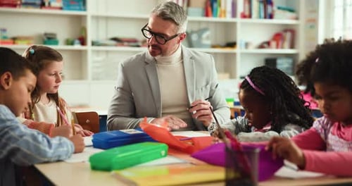 Children Learning with a Teacher in a Classroom