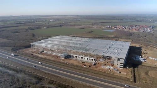 Large Warehouse Construction Project Building Site Aerial View