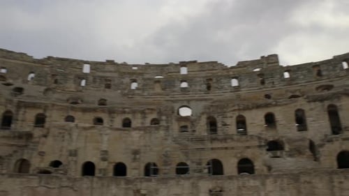 Old Historical Ruins Of El Jem Amphitheater In Tunisia - panning shot
