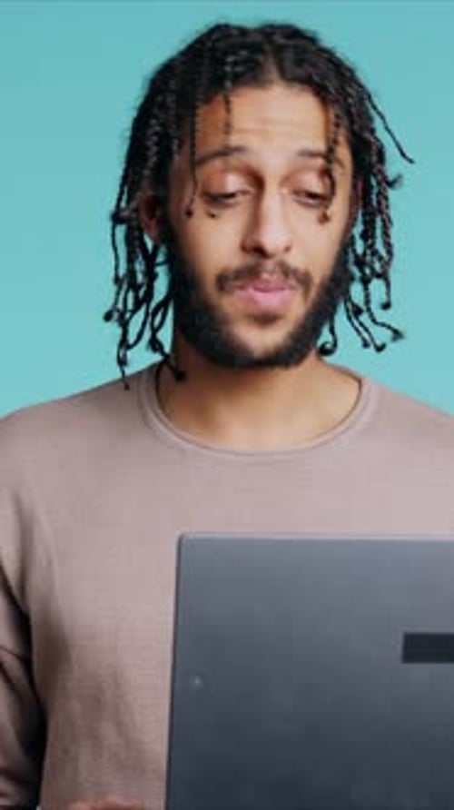 Vertical Video Happy Person Bonding with Mate Using Notebook to Hold Videoconference Studio