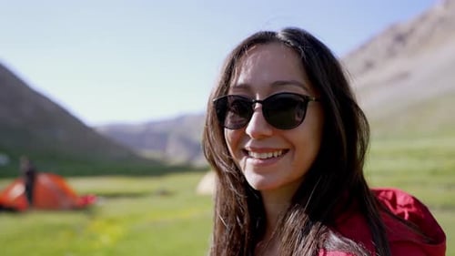 Happy Woman Smiling in the Mountains