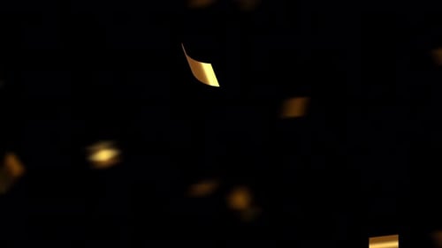 Falling Gold Confetti with soft focus.