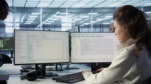 Diverse Team Coding in Modern Office Environment