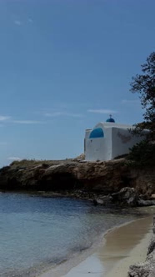 Church at Alyko Beach Naxos Island Greece in Vertical