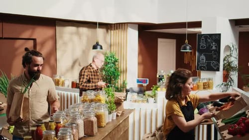 Man in Bio Food Shop Helped By Seller