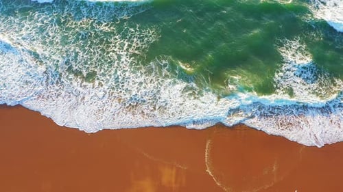 Aerial View Wave on the Beach with Sand and Turquoise Waves