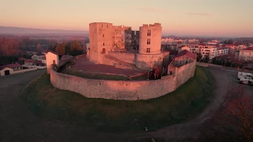 drone shot above Montrond les bains Castle, medieval french castle in la plaine du Forez, Loire depa