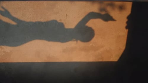 Sensual Woman Shadow Moving on Building Wall Girl Moving Body Vertically View