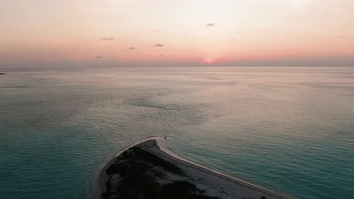 sand bank maldivian beach at sunset