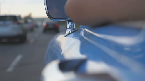 Side Mirror of Old Retro Car Riding on Highway at Summer Day Young Man Driving a Blue Vintage