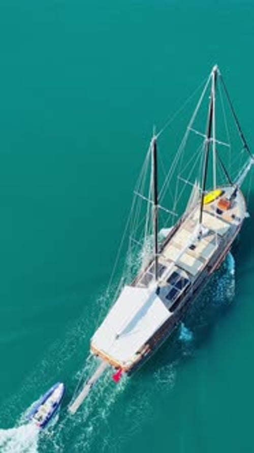 Top view vertical drone of gulet on summer sea