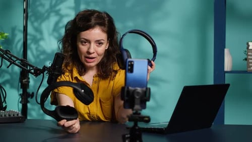 Woman Reviews Headphones During Home Podcast