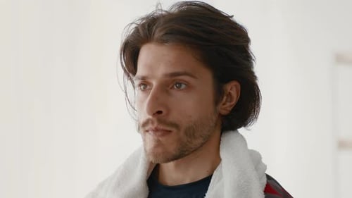 Young Man Working Out with Dumbbell