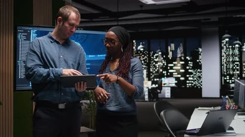 Technicians Collaborating to Develop Artificial Intelligence Algorithms