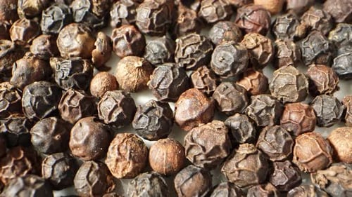 Extreme Close Up of Dried Black Peppercorns