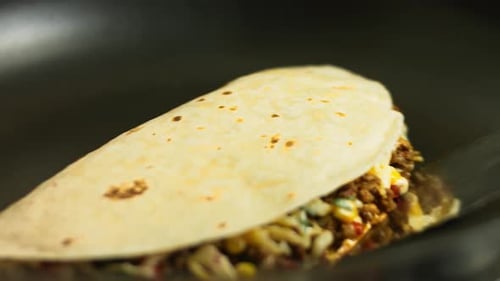 Delicious Quesadilla Cooking in a Pan