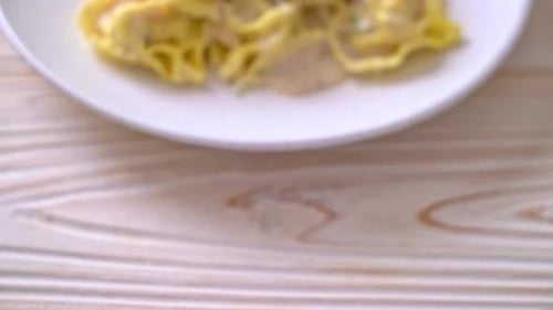 Plate of Delicious Pasta with Cream Sauce