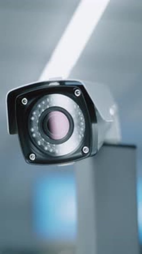 Close Up of Installed CCTV Camera in Modern Airport Terminal