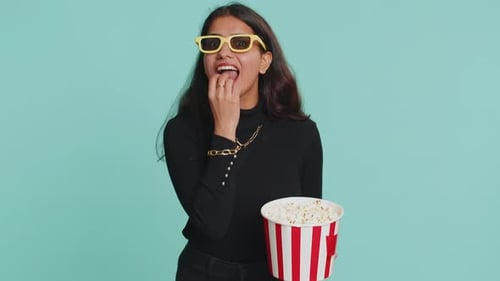 Enthusiastic Woman Watching Movie with Popcorn