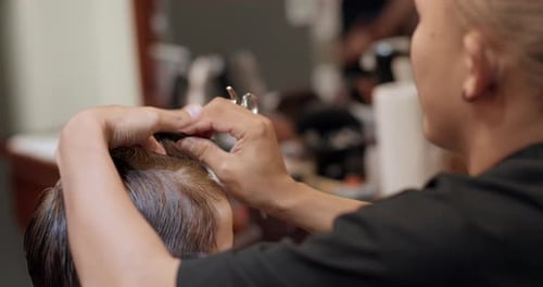 Stylist Cuts Short Hair in Beauty Salon