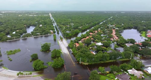 Flooded Florida Road in Suburban Residential Area Driving Hazard Aftermath of Hurricane Natural