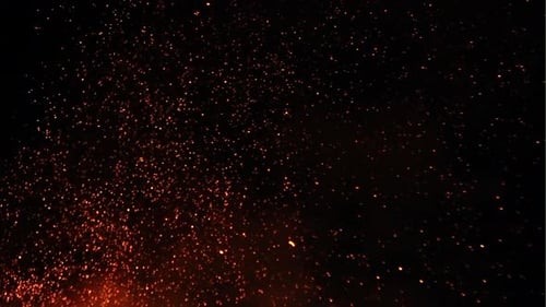 Abstract Red Particles Drifting on Black Background