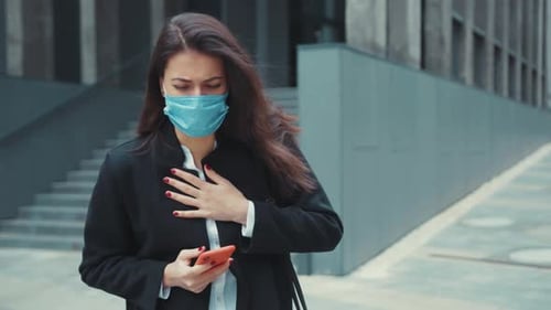 Young Caucasian Woman Office Manager Using Smartphone on Break Suffering From Chest Pressure Aches