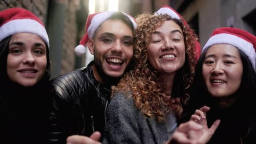 Smiling Friends Celebrate Christmas Together in City