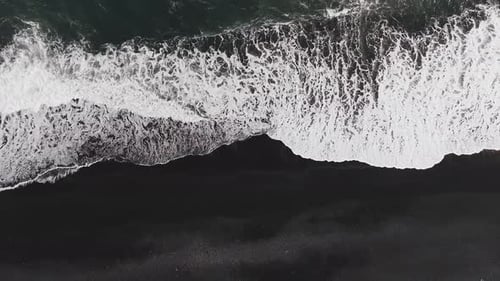 The Black Sand Beach in Iceland Sea Aerial View and Top View