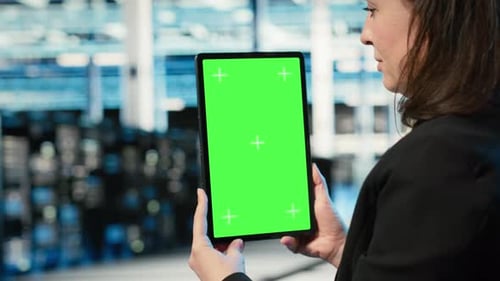 Green Screen Tablet Used By Data Center Admin to Optimize Server Load Balancing