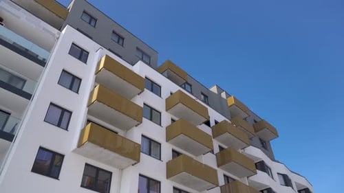 Modern Apartment Building Exterior on Sunny Day