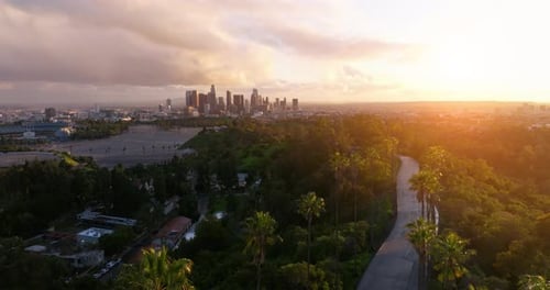 Epic Los Angeles downtown view on pink cinematic sunset.