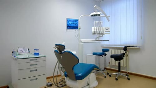 Interior of modern dental clinic. Interior of new modern dental clinic office with chair