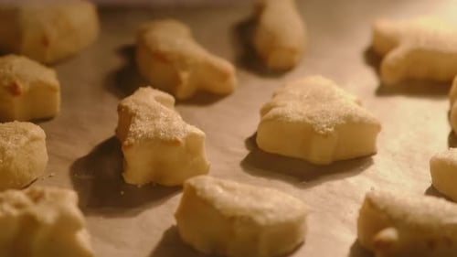Process of baking cookies from puff pastry in the oven, timelapse. Cooking cookies in the shape