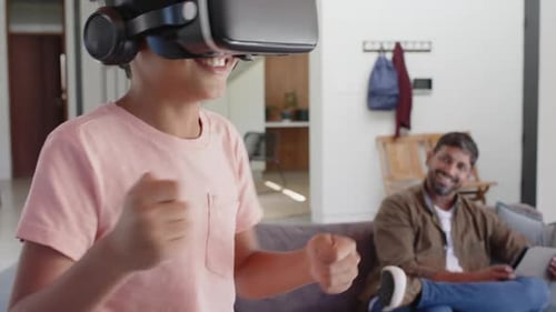 Child Enjoying Virtual Reality with Dad Watching