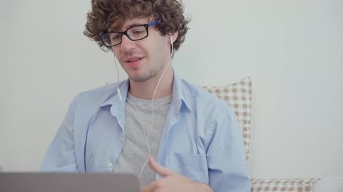 Young Adult on Video Call Indoors