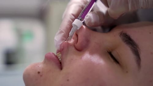 Woman Getting Lip Injection Cosmetic Beauty Treatment